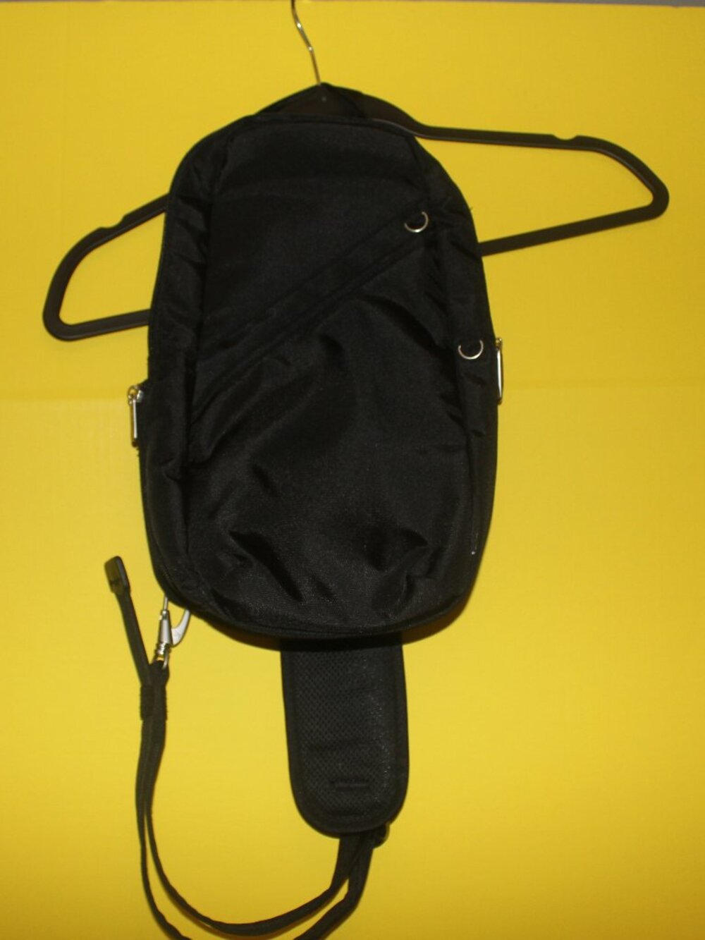 CROSSBODY SLING BACKPACK SHIELDED POCKET TRAVEL COLOR BLACK READ THE DESCRIPTION